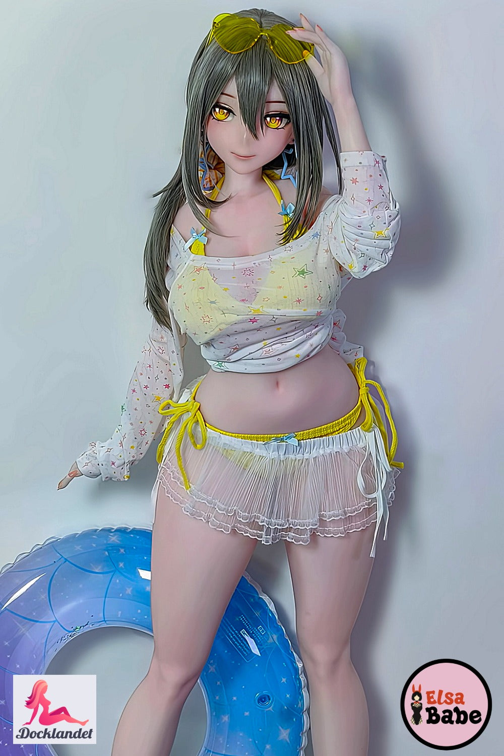 Mizuta Nina 151 cm Elsa Babe anime silikoonnukk tumeroheliste juuste, kollaste silmade ja kollase suvekomplektiga.